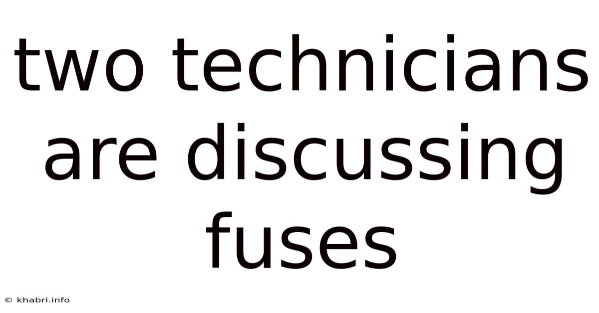 Two Technicians Are Discussing Fuses